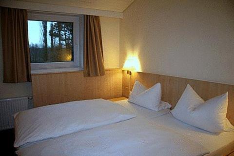 Landhaus Berger Hostal Feldhausen Habitación foto